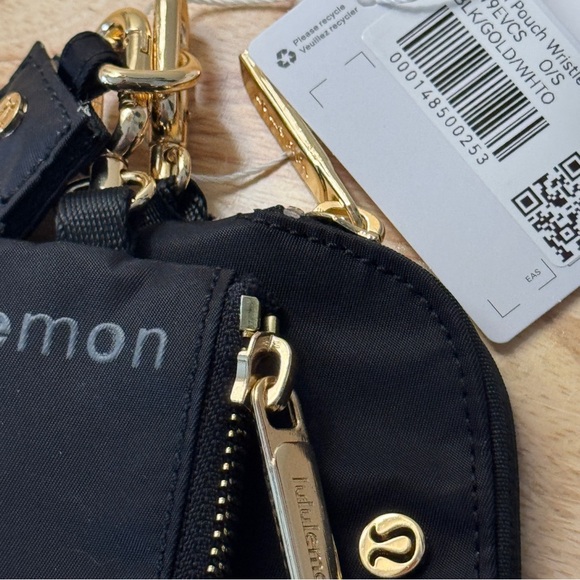 NWT Lululemon Dual Pouch Wristlet Black Gold Wordmark NWT - Picture 3 of 7